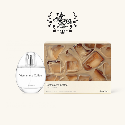 Vietnamese Coffee perfume bottle and packaging on a white background with an award logo.