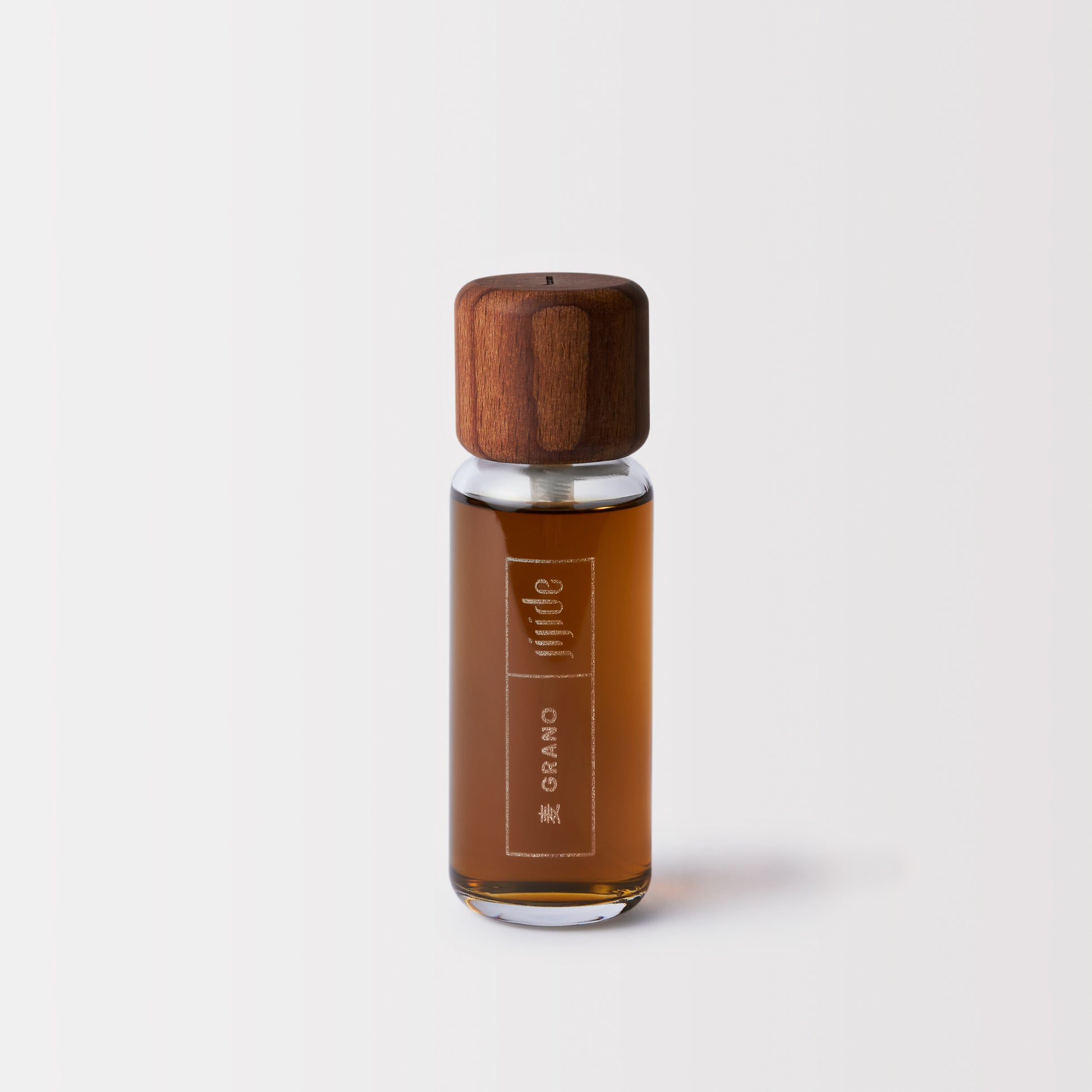 Bottle with wooden cap on a white background
