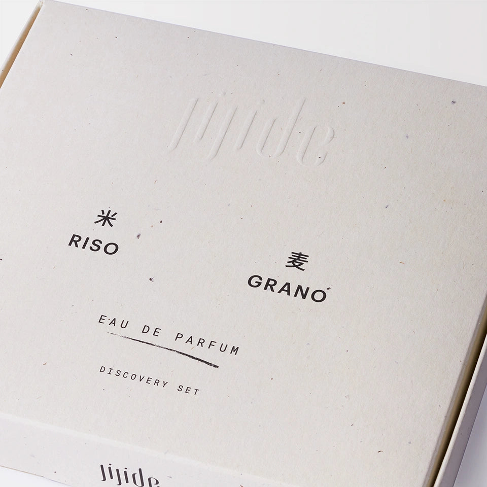 Close-up of a Riso Grano eau de parfum packaging with text on a white background